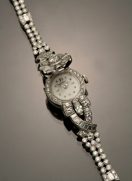 Appraisal: Lady's Platinum and Diamond -Jewel Manual-Wind Concealed Face Cocktail Wristwatch