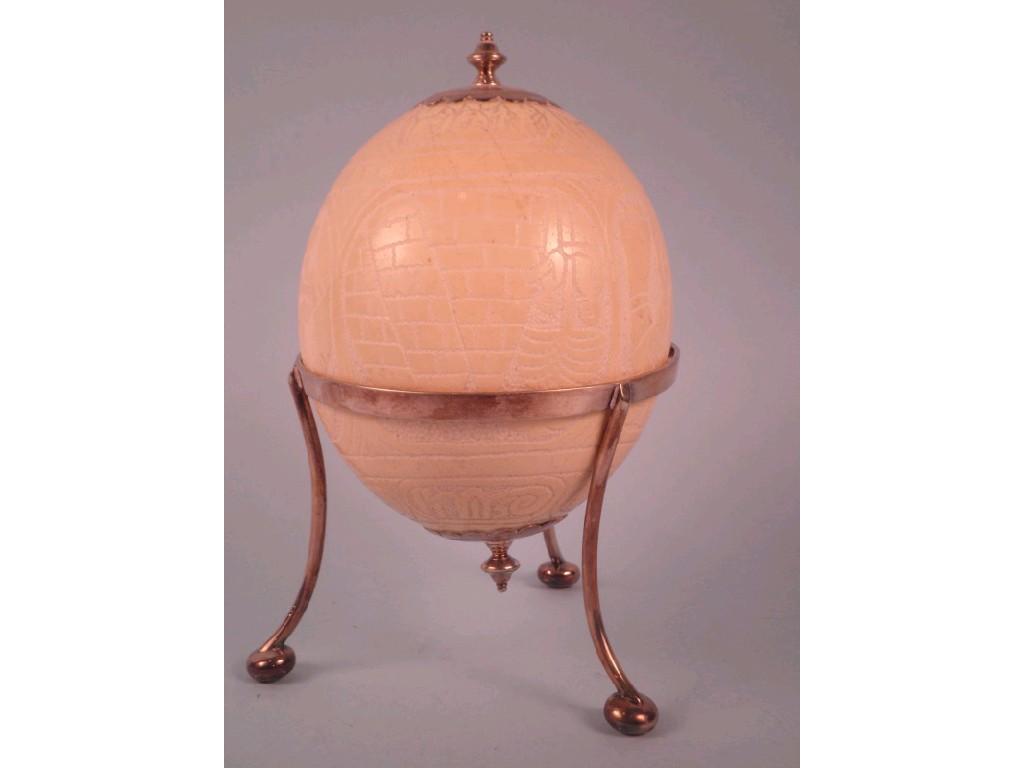 Appraisal: An ostrich egg with plated mounts carved with figures and