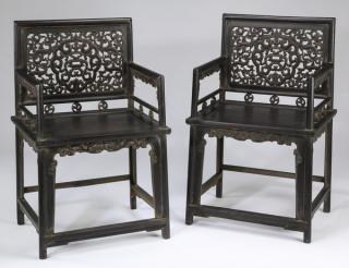 Appraisal: Chinese carved zitan armchairs h Pair of Chinese carved zitan