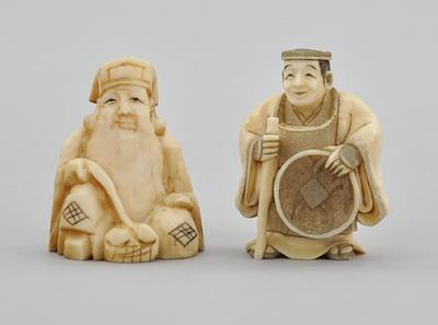 Appraisal: Two Carved Ivory Netsukes A carved elephant ivory netsuke depicting