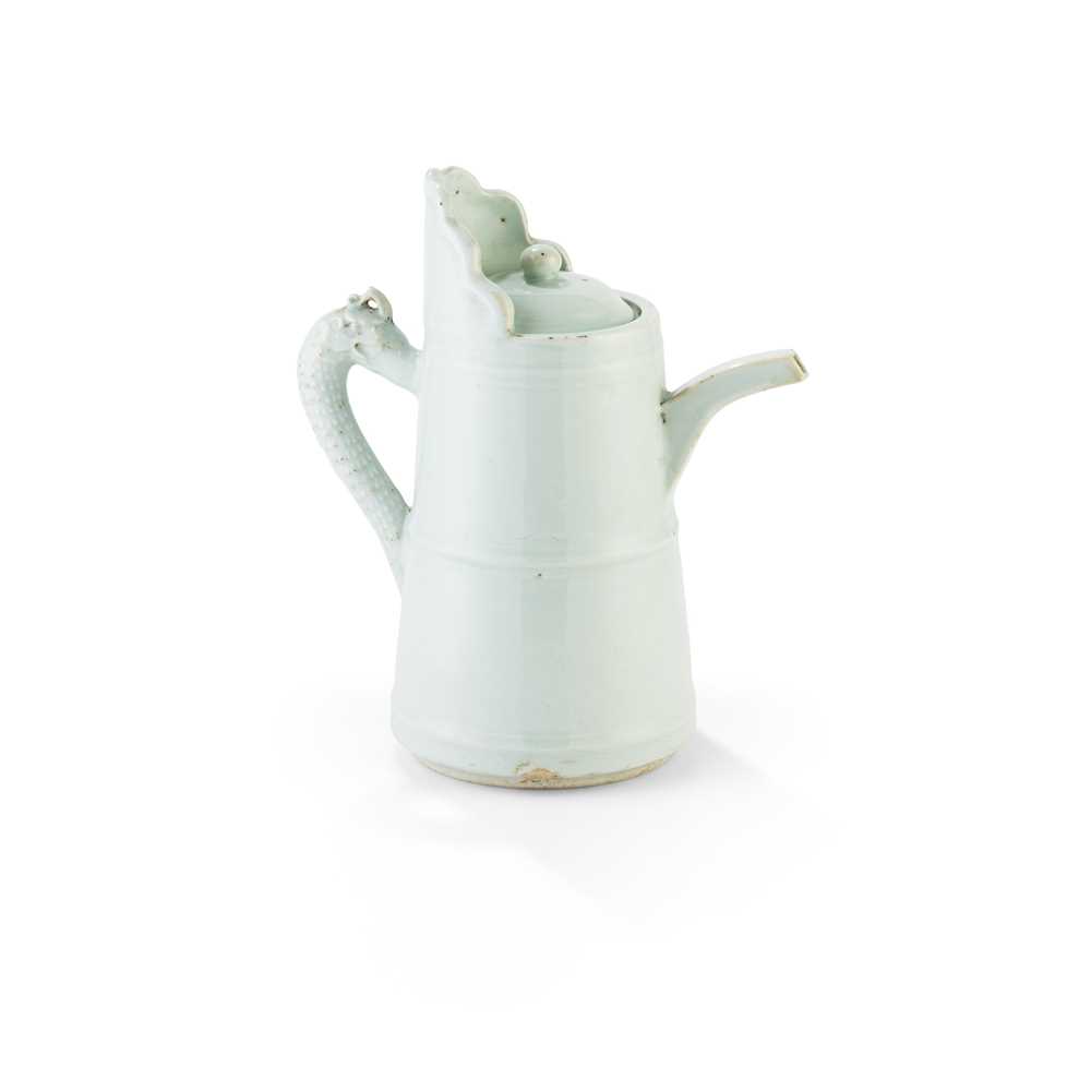 Appraisal: QINGBAI-GLAZED 'MDONG-MO' BUTTER-TEA EWER YUAN DYNASTY OR LATER of tapered