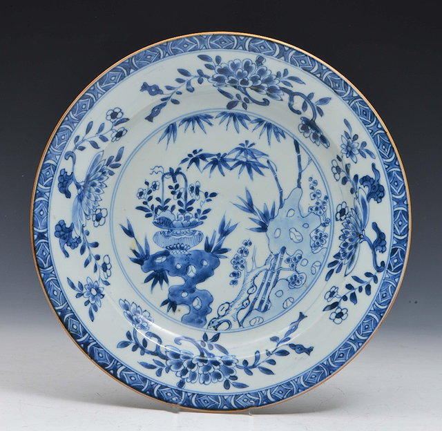 Appraisal: A CHINESE BLUE AND WHITE PLATE decorated with peony and