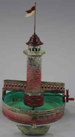 Appraisal: FALK LIGHTHOUSE WITH MOAT STEAM ACCESSORY Germany hand painted tin