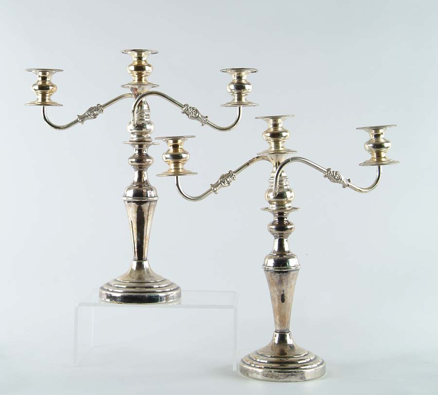 Appraisal: PAIR OF TWO PART ENGLISH SILVER PLATED CANDELABRAS Bottoms marked