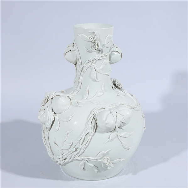 Appraisal: Chinese white glazed porcelain vase with molded peaches and flowers