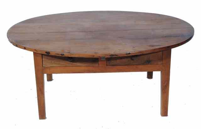 Appraisal: AN ANTIQUE FRENCH PROVINCIAL FRUIT WOOD LOW OCCASIONAL TABLE the