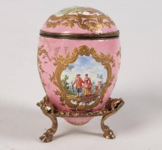 Appraisal: FRENCH PINK ENAMELED EGG SHAPED HINGED BOX WITH HANDPAINTED COURTING