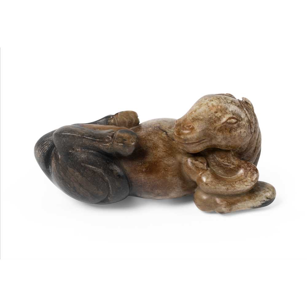 Appraisal: CHICKEN BONE' JADE CARVING OF RECLINING HORSE MING DYNASTY carved