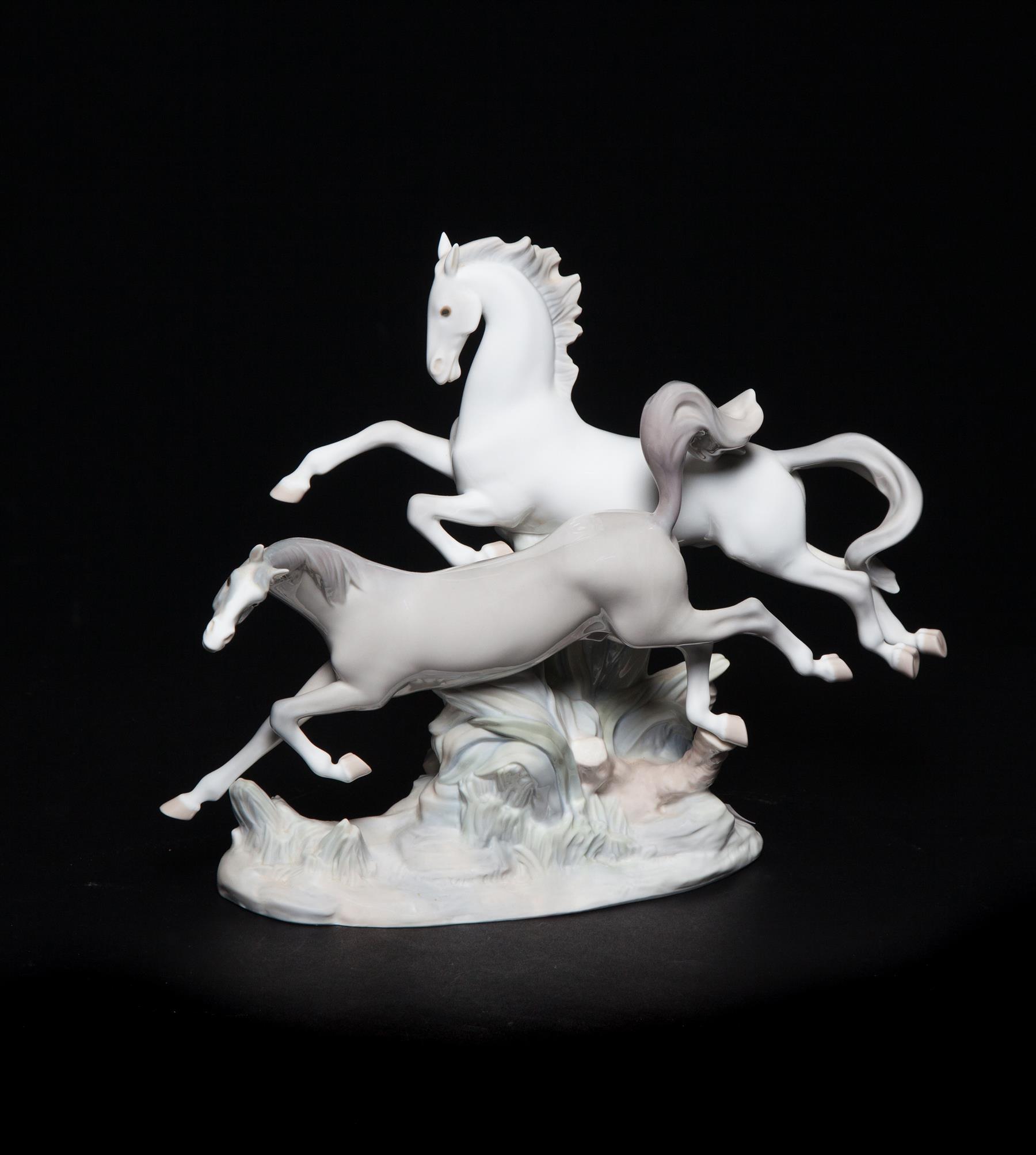 Appraisal: LLADRO FIGURAL GROUP OF HORSES Spain th century High glaze