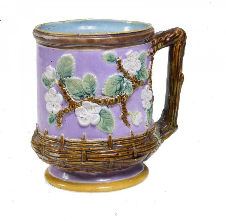 Appraisal: A GEORGE JONES MAJOLICA APPLE BLOSSOM MUG with rustic handle