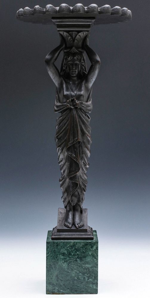 Appraisal: FIGURAL MAIDEN STAND The cast resin top on carved wood