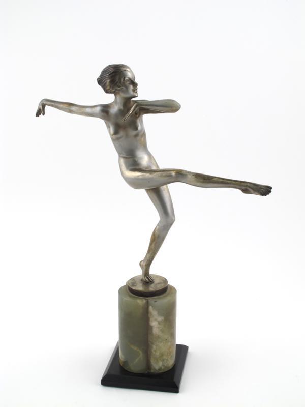 Appraisal: A large silvered bronze figure of a nude dancer