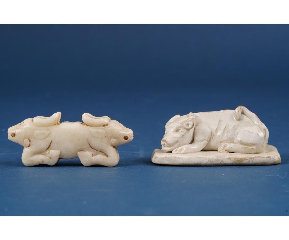 Appraisal: Two early Chinese carved animal figures to include a stone