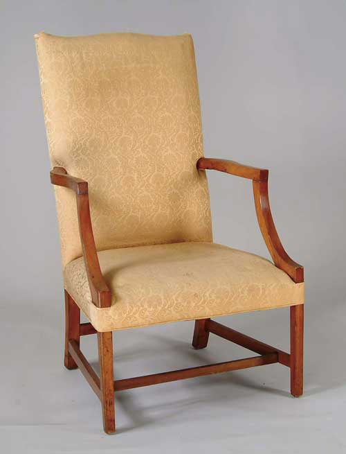 Appraisal: HEPPLEWHITE MAHOGANY MARTHA WASHINGTON ARMCHAIR Cyma curved crest having shaped