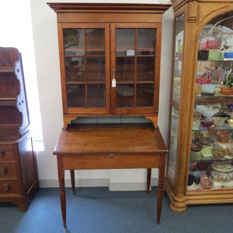 Appraisal: Plantation Desk th century panel glass doors over lift top