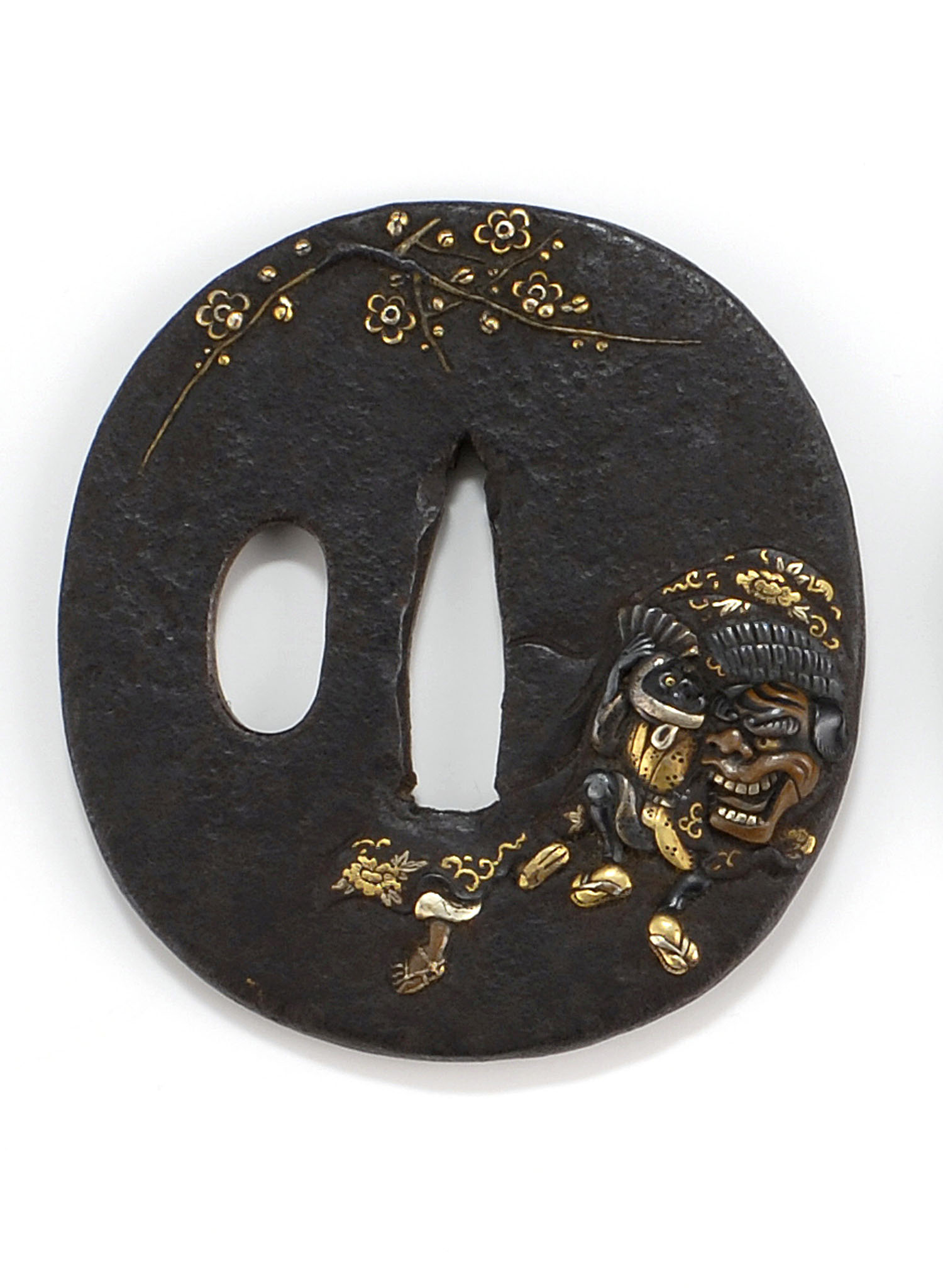 Appraisal: INLAID IRON NAGA MARU-GATA TSUBA Circa Depicting figures in shishi