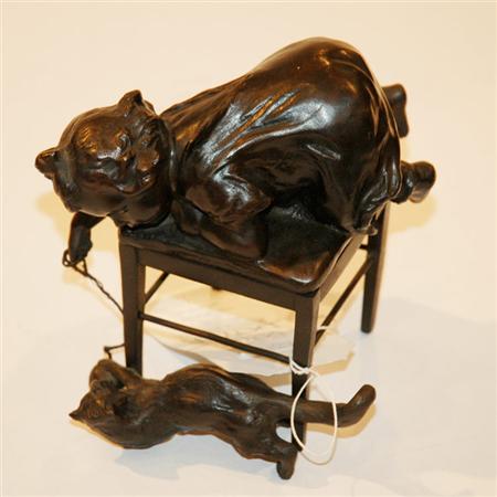 Appraisal: Bronze Sculpture of Girl Playing with Cat Estimate -