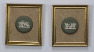 Appraisal: Pair of framed putti jasperware plaques h Pair of framed