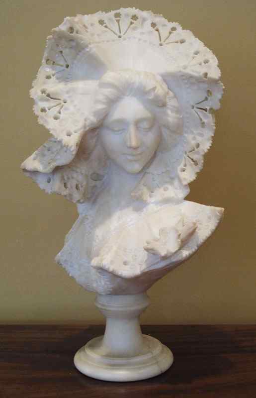 Appraisal: ALABASTER BUST OF A MAIDEN SIGNED CIPRIANI '' h rests