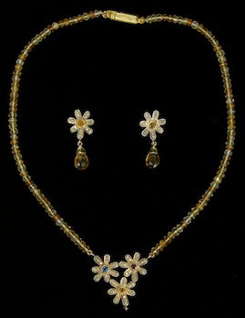 Appraisal: A Pretty Citrine Bead Necklace and Earrings The necklace consists