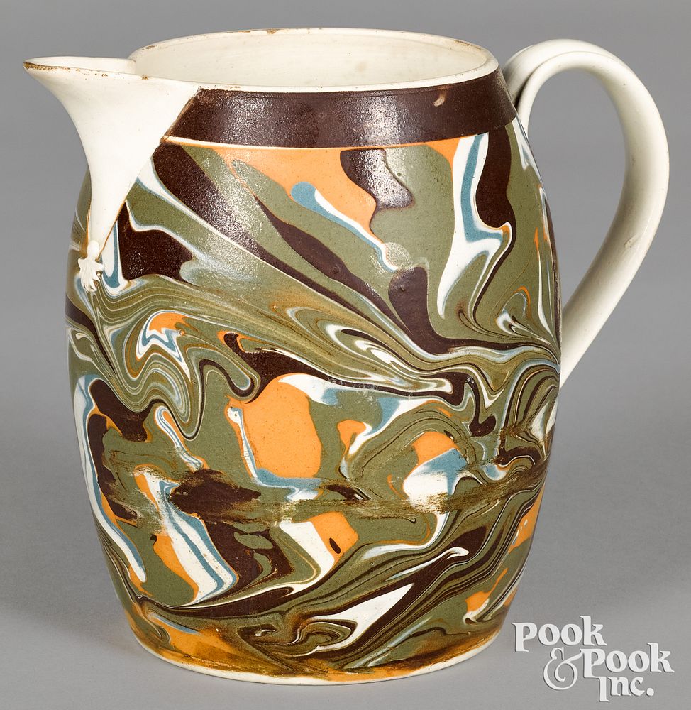 Appraisal: Mocha pitcher with marbleized decoration Mocha pitcher with marbleized decoration