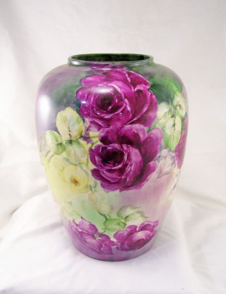 Appraisal: Hand Painted Floral Vase Hand decorated porcelain vase with red