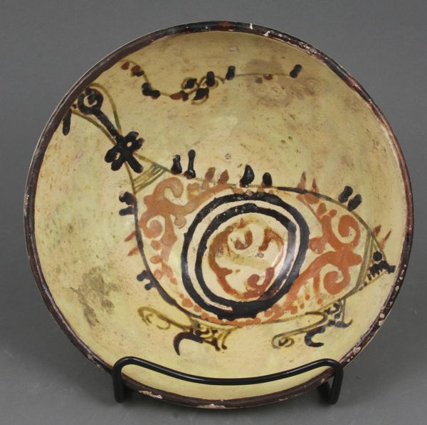 Appraisal: Rare th th Century Islamic glazed pottery bowl with bird