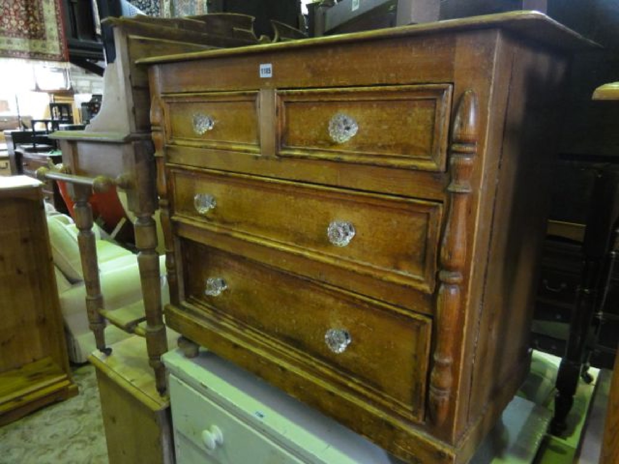 Appraisal: A small Victorian stripped pine bedroom chest of two long