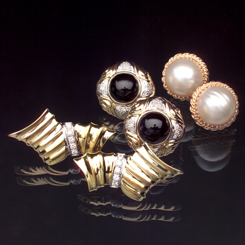 Appraisal: MODERN Gold earrings three pairs all with omega backs button