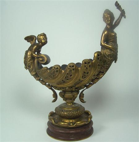 Appraisal: A Belle Epoque gilt bronze table centrepiece of gadrooned and