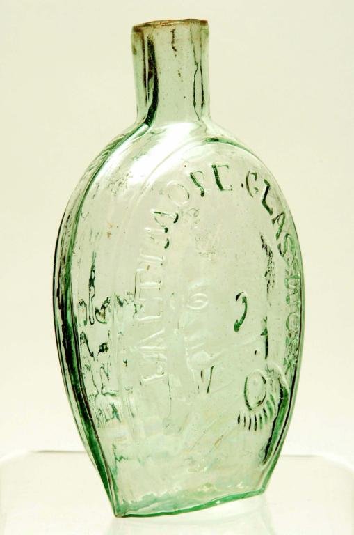 Appraisal: Baltimore Glass works flask Mold blown light green glass flask