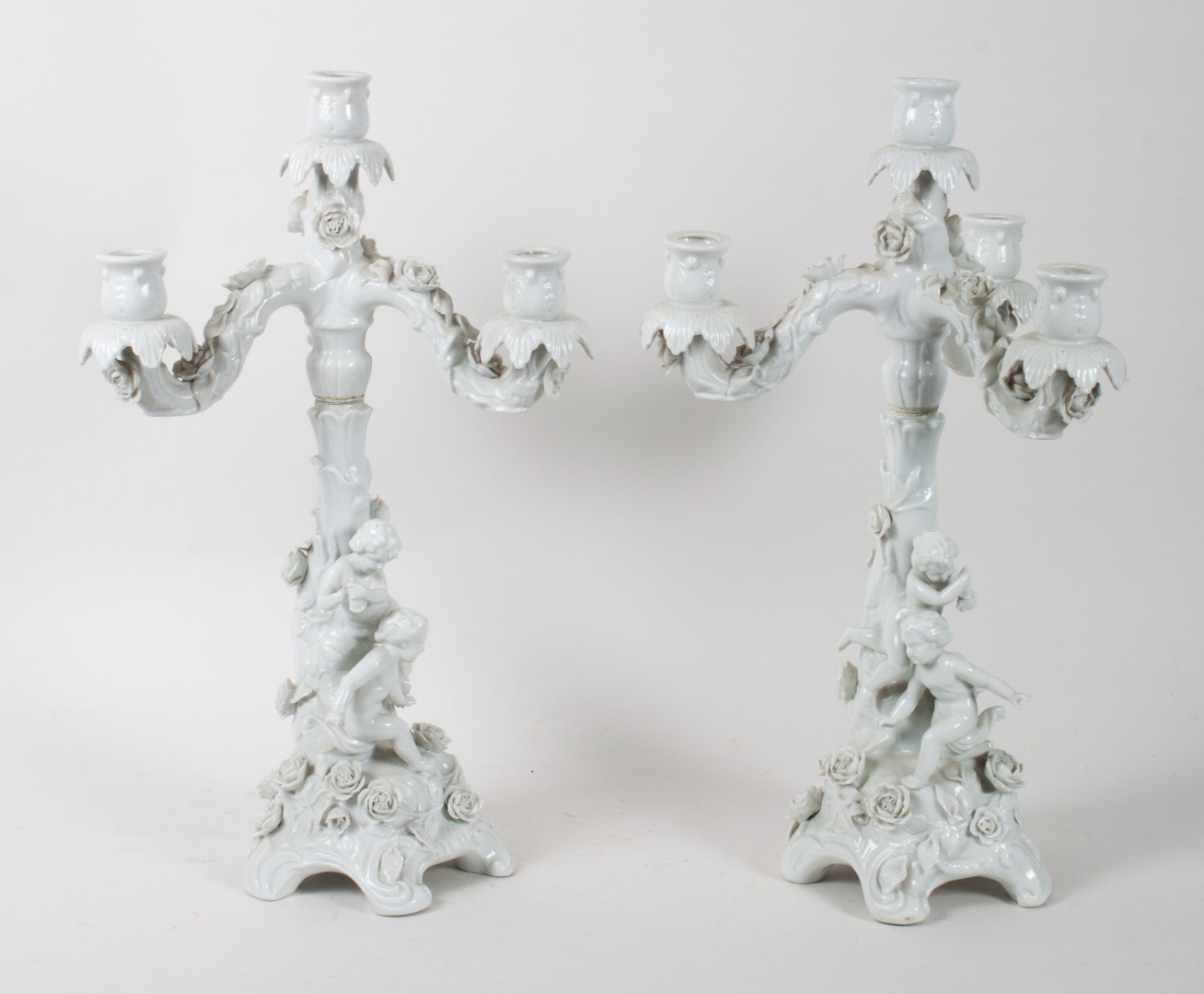 Appraisal: Pair of Sitzendorf white porcelain candelabra early th century four-light