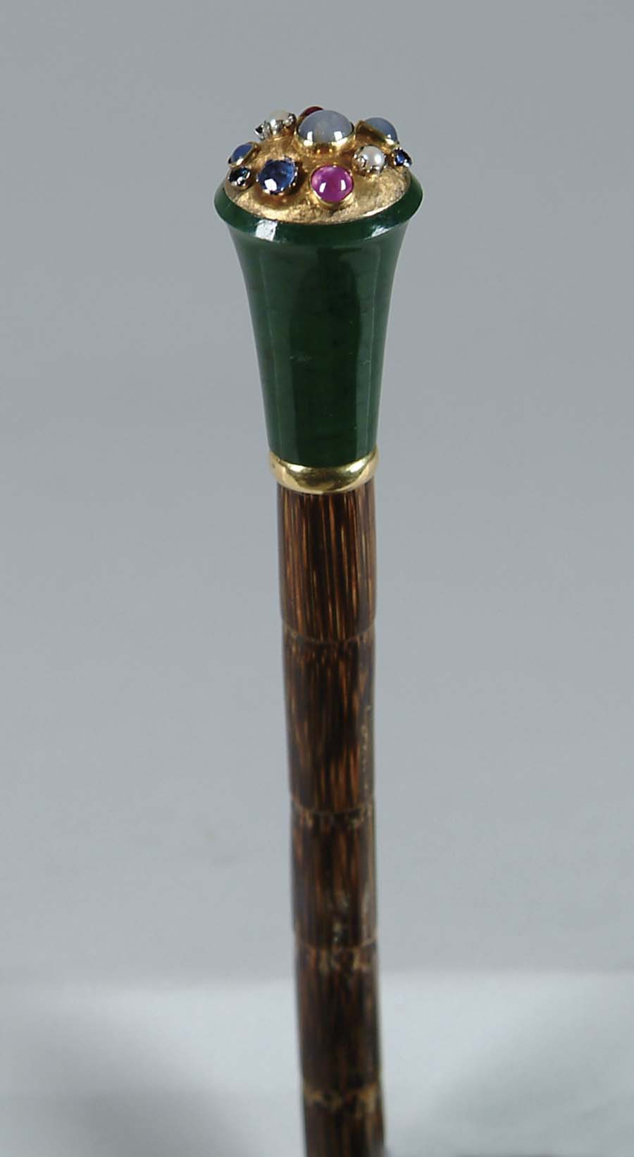 Appraisal: CANE OUTSTANDING JADE AND GEMSTONE CANE The trumpet shaped green