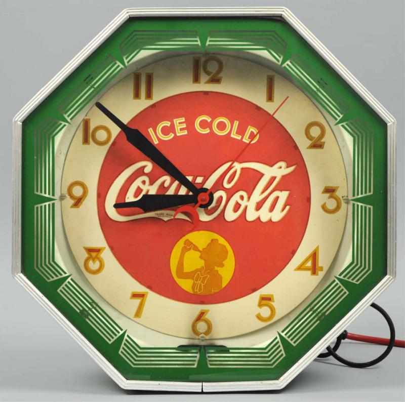 Appraisal: Late s Coca-Cola Octagonal Neon Clock Original neon emits nice