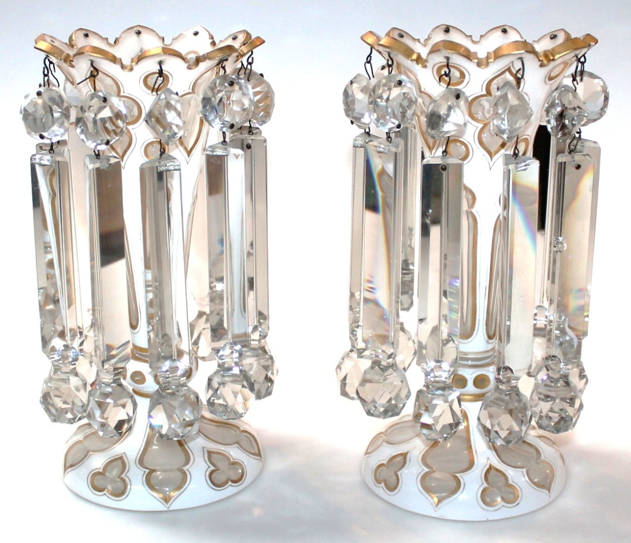 Appraisal: A pair of thC Bohemian clear and milk glass lustres