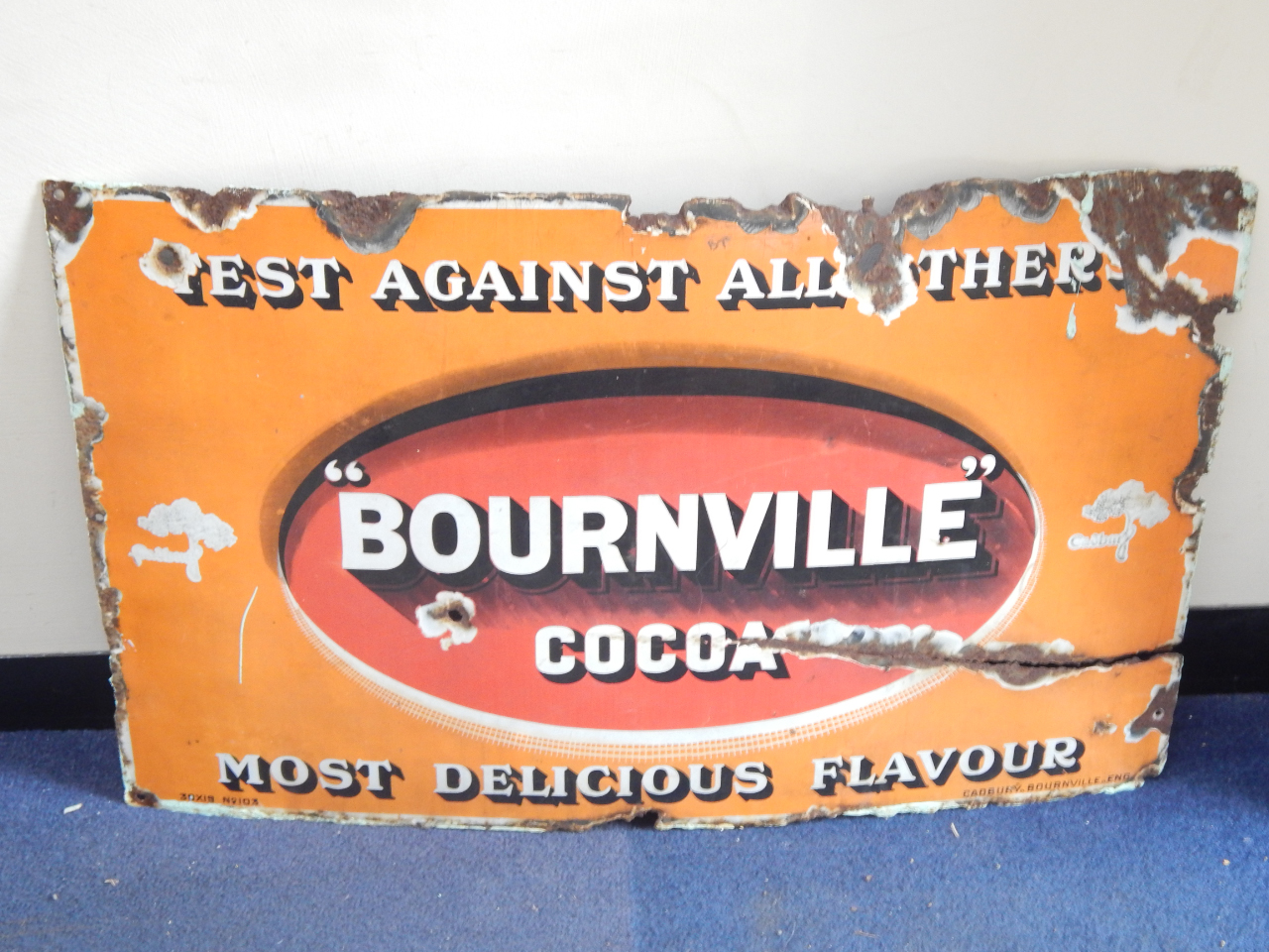 Appraisal: A Bournville Cocoa enamel sign Test Against All Others Most