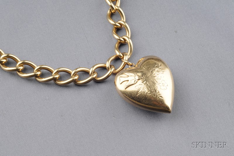 Appraisal: kt Gold Heart Charm Bracelet the puffed heart with bird