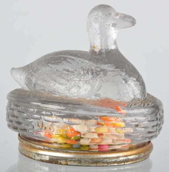 Appraisal: Glass Duck on Nest Candy Container Description Original bottom closure