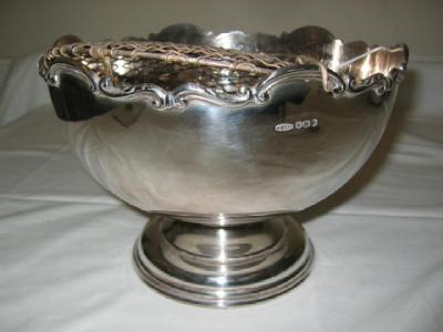 Appraisal: A ROSE BOWL of low pedestal form with scroll case