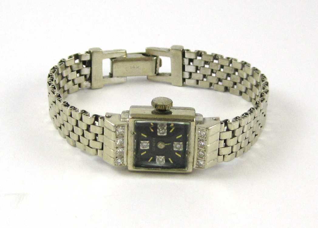 Appraisal: LADY'S DIAMOND AND FOURTEEN KARAT WHITE GOLD WRIST WATCH having