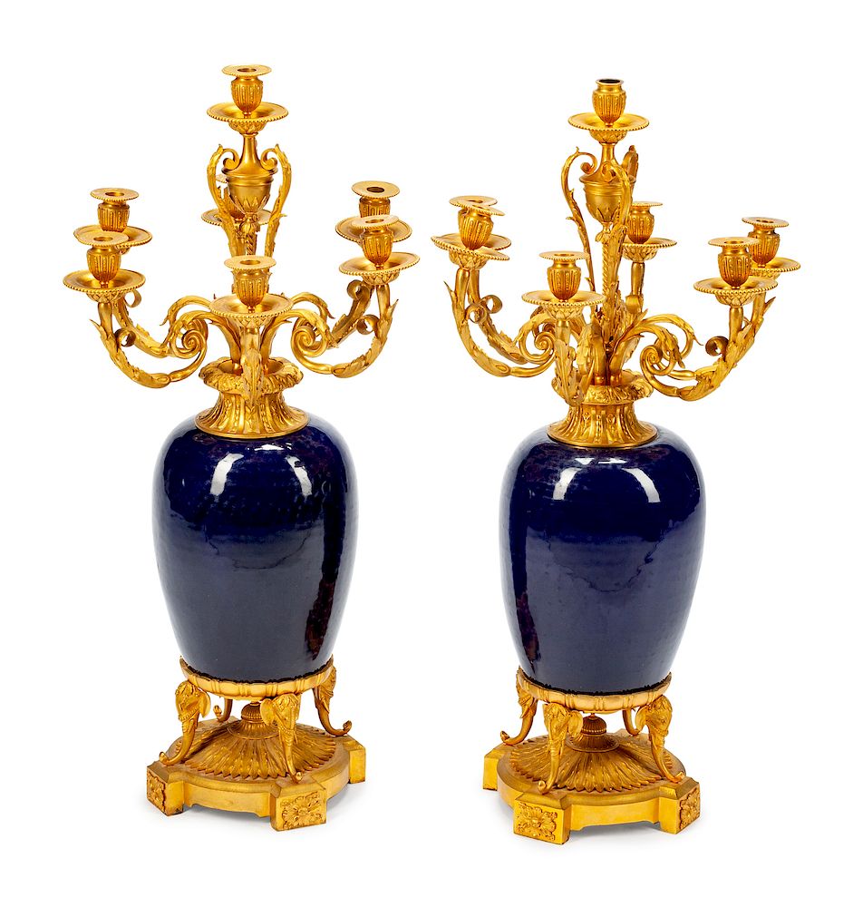 Appraisal: A Pair of Louis XV Style Gilt-Bronze-Mounted Porcelain Seven-Light Candelabra