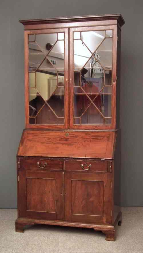 Appraisal: An early th Century mahogany bureau bookcase the upper part