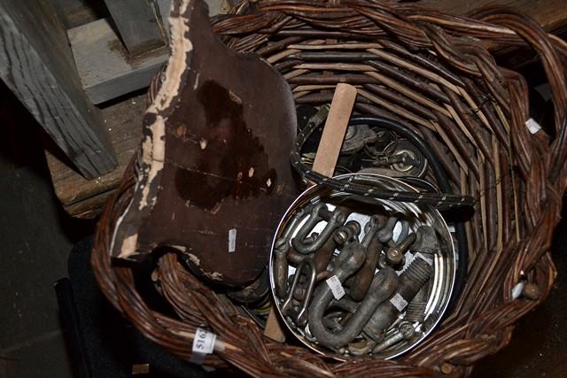 Appraisal: A BASKET WITH CONTENT INCLUDING OLD TOOLS RADIATOR CAPS PULLEYS