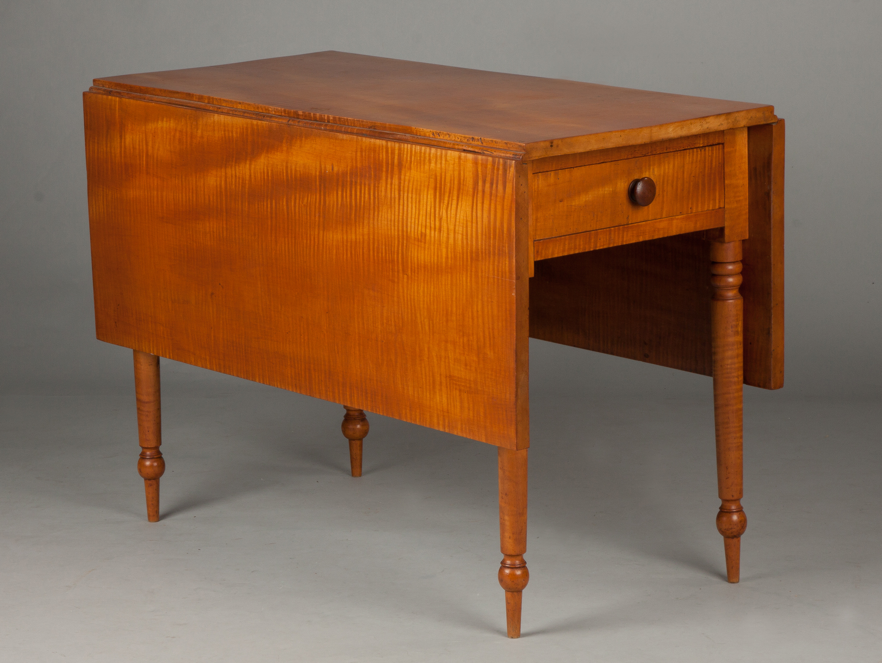 Appraisal: Country Sheraton Tiger Maple Drop Leaf Table with Drawer Early