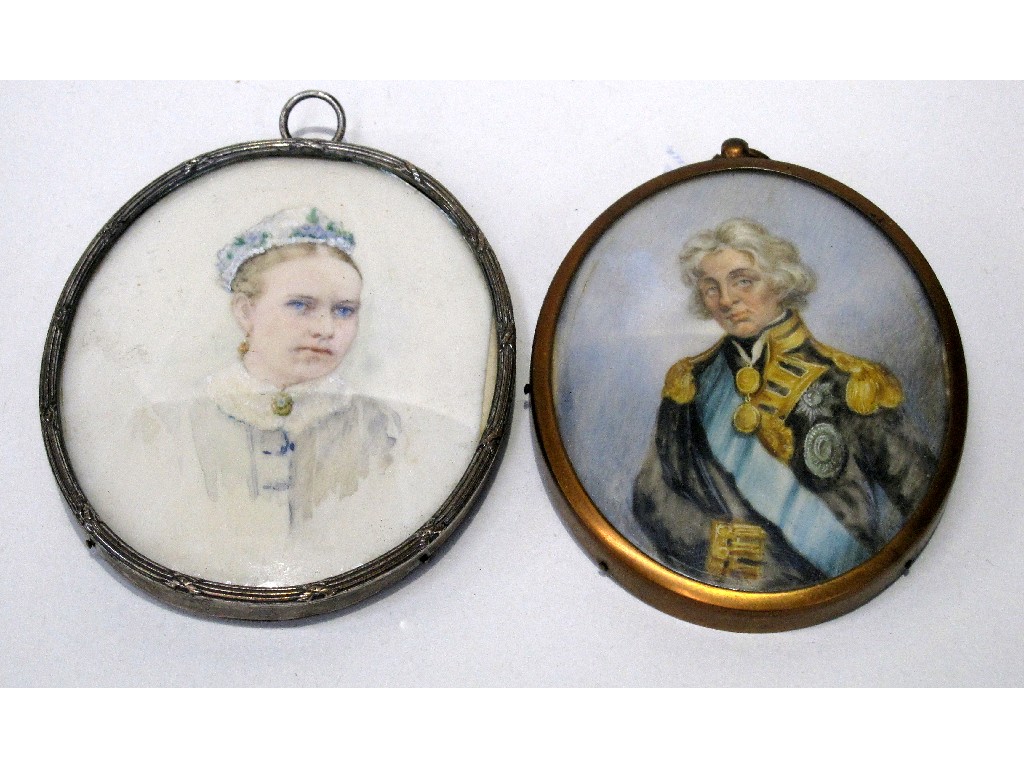 Appraisal: Two portrait miniatures in oval frames - Lady and a