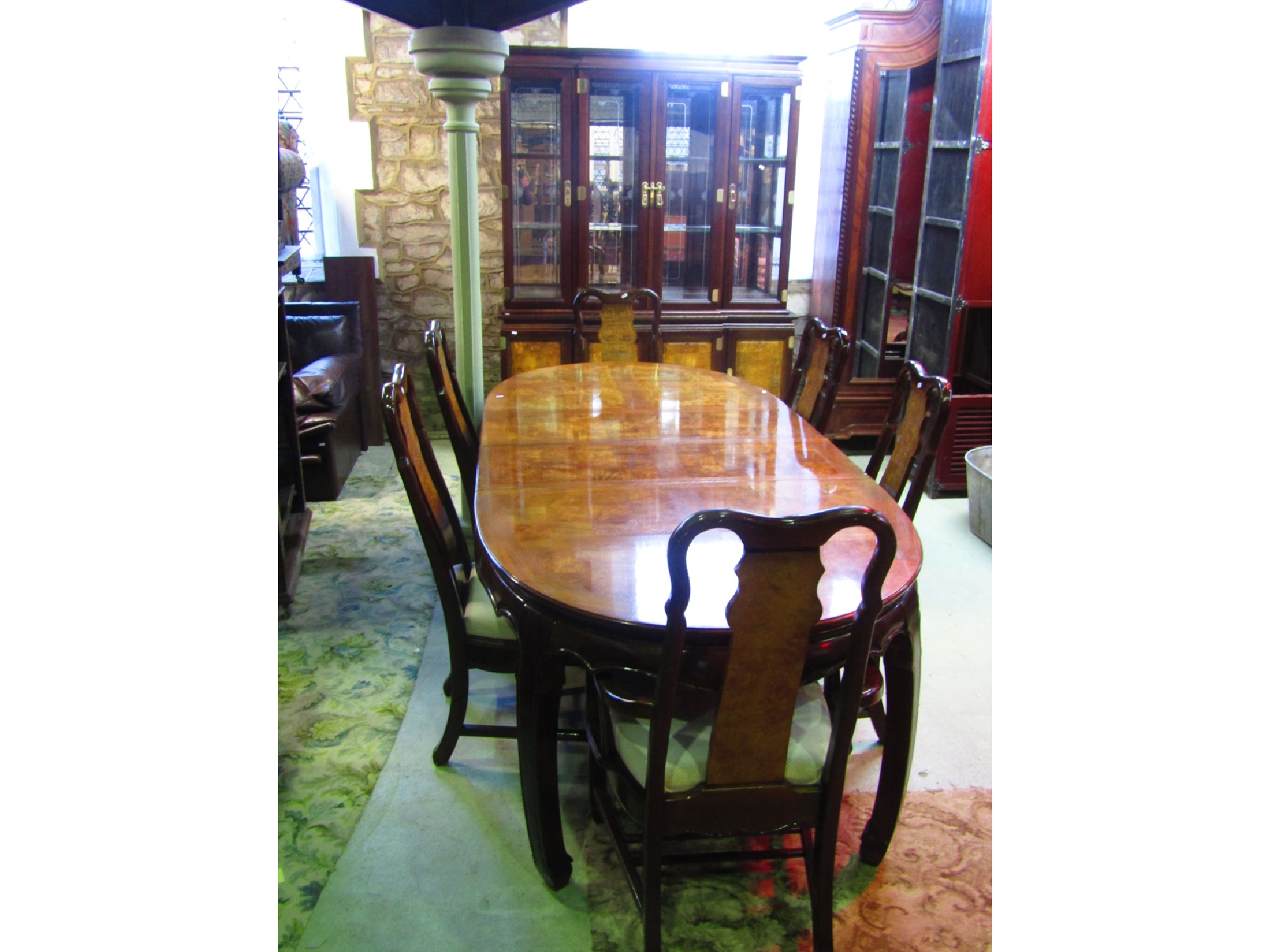 Appraisal: A contemporary Chinese hardwood D end pull out extending dining