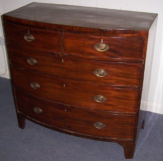 Appraisal: An early th Century mahogany bowfront chest fitted three long