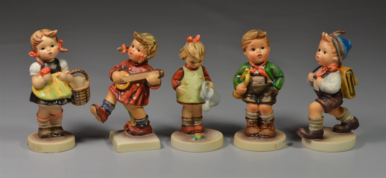 Appraisal: Goebel Hummel Figurines Little Gardener Trumpet Boy School Boy Sister