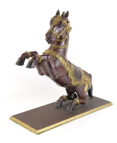 Appraisal: An Eastern hardwood carving of a rearing horse on a