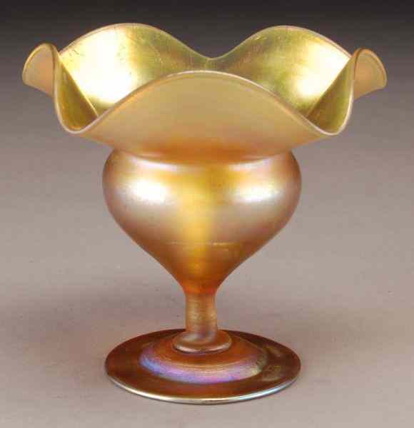 Appraisal: Tiffany gold Favrile glass flower form footedcompote form with a